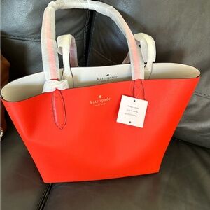 Orange Kate Spade New bag tags still on it